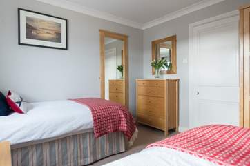Oak furniture throughout providing ample storage.