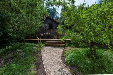 The cabin is tucked away at the back of the orchard and feels very private. You will need to carry your bags up from the parking space.