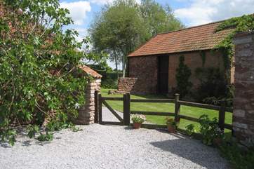 This is where you can park. The cottage is behind the fig tree to the left and the old stone barn to the right is a characterful reminder of times past ( not used when you are in the cottage )
