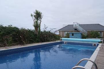 The outdoor swimming pool.