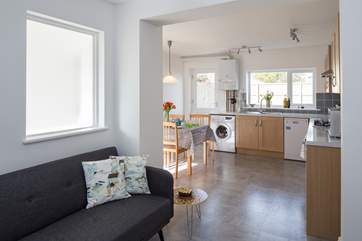 The open plan living is ideal for watching the littles ones whilst you relax on the sofa