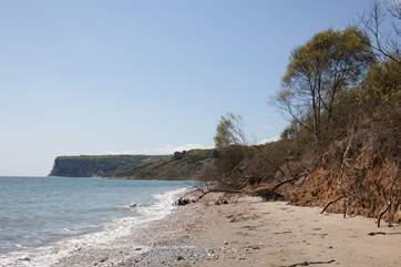 Walk along the picturesque beach and walk along to Wightcliff Bay