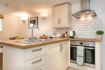 The stylish kitchen-area.