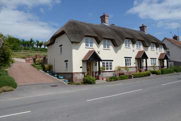 From the other direction, this shows the access to the parking behind the cottage.
