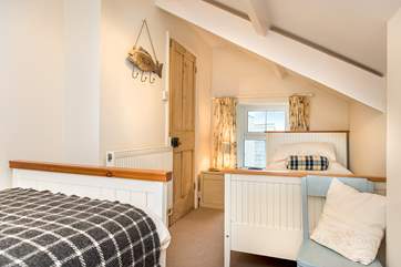 Bedroom 3 with twin beds (please mind your head with the sloping ceiling).