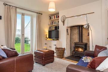 The cosy sitting-room with its toasty wood-burner makes this an ideal reatreat whatever the weather.