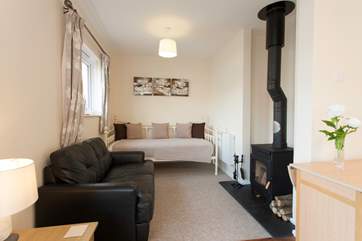 Cosy up by the wood-burner on the colder evenings