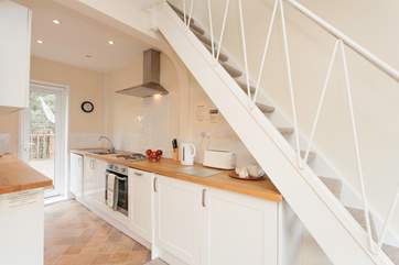 The galley kitchen comes equipped with everything you need to enjoy your Island holiday