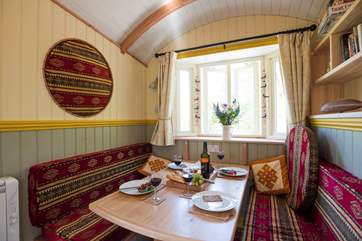 Spot the difference! The clever cushions fit into the quirky circular windows for a black-out effect.