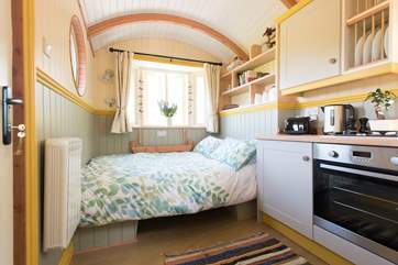The dining table turns into a second double bed with ease, if required.