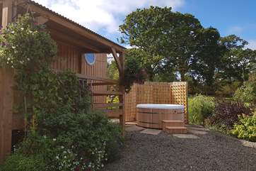 Sit back and relax in the bubbling hot tub (new for October 2018).