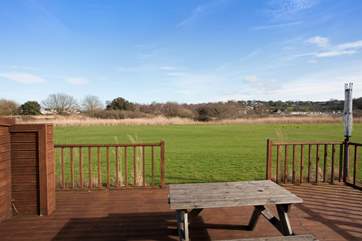 The decking out to the back looks across to the Seaview Nature Reserve