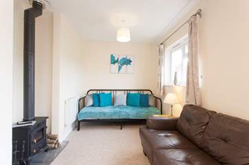 Grab your favourite book and snuggle up in front of the TV and wood-burner for a cosy evening in