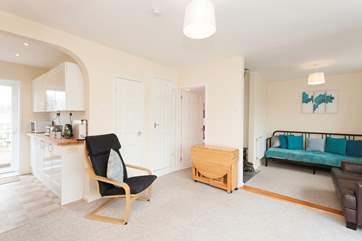 The open plan setting is ideal to keep an eye on the little ones whilst you are in the kitchen or relaxing in front of the TV