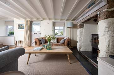 Relax in front of the roaring wood-burner.
