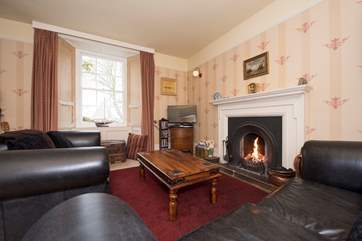 There's a roaring open fire in the sitting/dining-room.