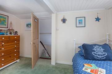 The top of the staircase, leading to bedroom 3 is narrow and the stairs are steep, so take care.