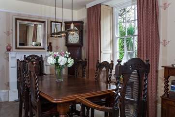 The more formal dining-area overlooks the rear garden and estuary.