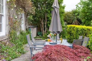 The rear terrace, is the perfect place for dining.