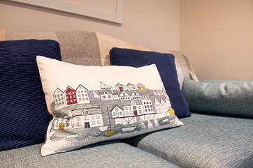 Lots of lovely cushions give the cottage a homely feel.