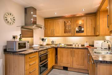 The kitchen is very well-equipped and leads out to the patio-area making it easy to serve up if you want to enjoy a meal outside.