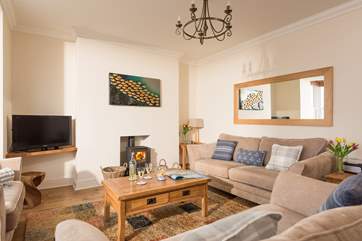 This is a wonderfully comfortable place to relax with a glass of wine while toasting your toes in front of the wood-burner.
