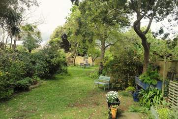 The garden is enclosed and a perfect area for a barbecue.