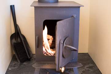 There is a cosy wood-burner in case the evening turns chilly, there is also an electric heater to keep you toasty warm.