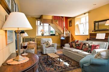 The stairs from the sitting-room lead up to the third bedroom.