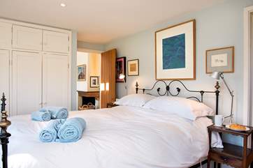 Bedroom 1 has a beautiful bedstead.