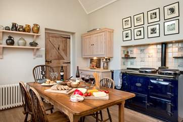 The kitchen has a gorgeous four oven Aga.