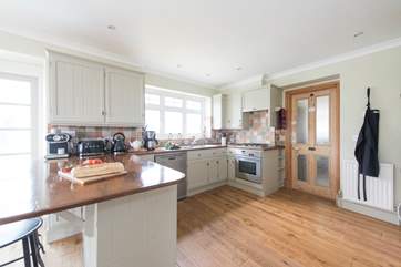 The kitchen-area, with top quality appliances including a Miele oven and Liebherr fridge