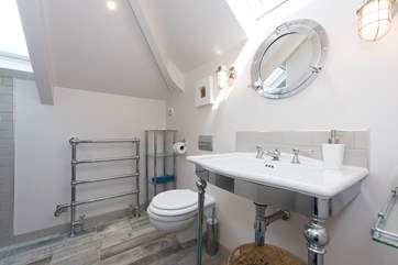 The ground floor family bathroom shower area.