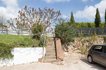 Step out of the property, take a short 20m walk to the right, up these steps, and just around the corner your own piece of paradise awaits.