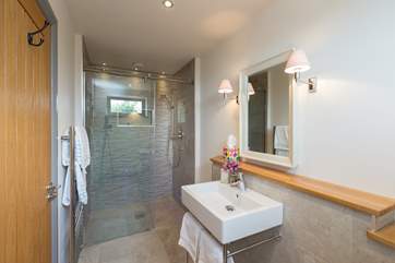 The en suite shower-room has a super-size walk in shower.
