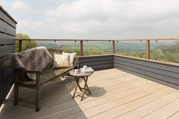 Breathtaking panoramic views across rural mid-Devon from the first floor balcony on this very special farmstead.
