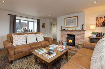 Another view of the living room which is off the kitchen/dining-room, walk through to the ground floor bedroom which is down one step.