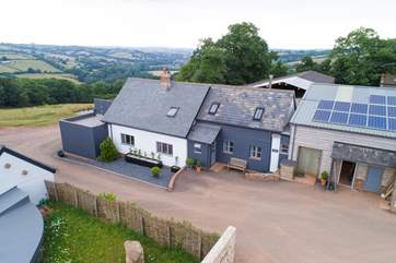 This is the stunning farmstead setting for the cottage - the white painted barn conversion to the left. Its outlook is away from the farmstead down the valley.