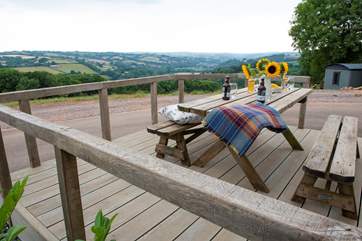 This is the view from the ground floor decking. You can literally see for miles. The wildlife pond is halfway down the hill in front of the cottage.