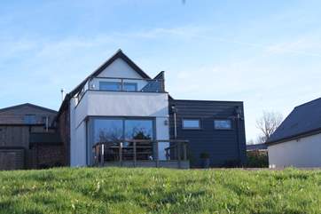 The cottage is in a fabulous position with vantage points from the ground floor deck and the first floor balcony.
