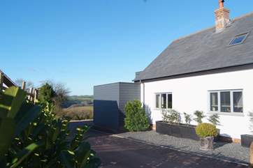 This will be your first view of the cottage on arrival. Drive around the far end for your private parking and entrance.