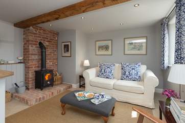 Put your feet up by the wood burning stove - all your wood is provided and you have a little wood store close to the front door.