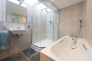 The ground floor bathroom houses a shower cubicle too.
