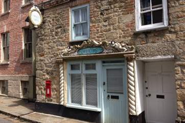 Welcome to The Chocolate House. The Chocolate House's famous and much-loved ornamental sign has recently been suffering from old age. It has temporarily been removed and will return again soon.