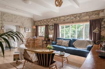 This lovely property is a wonderful combination of original stonework, hand crafted wood and plush and tactile fabrics.