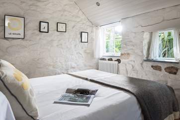 This calm space overlooks the courtyard garden.