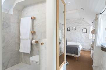 The fabulous open wet-room is next to the bedroom.
