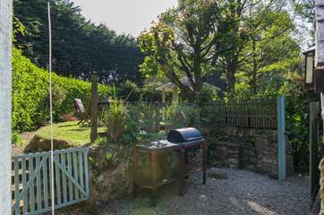 To the side of the cottage is your barbecue area and a gate leading to the boules court.