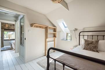 With the bedrooms at opposite ends of the cottage, there is privacy for all.