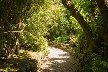 Follow the pathway through the lush gardens to find Carter's Croft passing Smugglers Lane and The Old Granary on your way (approx 200 yards).